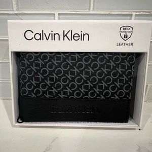 Calvin Klein Men's Genuine Leather Wallet with RFID Protection 3.5” by 4.5”